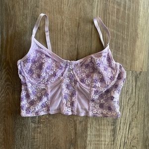 Purple flower going out top